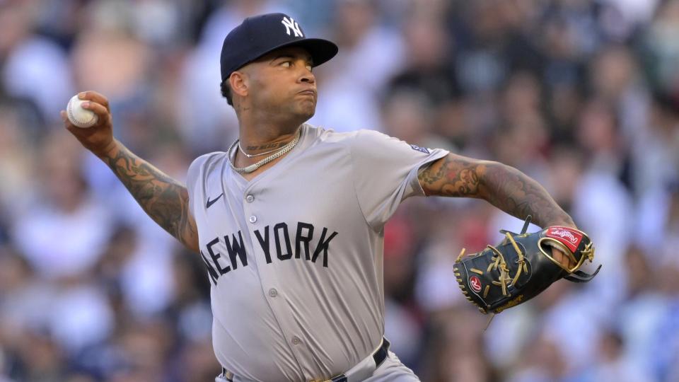 May 29, 2024;  Anaheim, California, USA;  New York Yankees starting pitcher Luis Gil (81) throws to the plate in the first inning against the Los Angeles Angels at Angel Stadium.