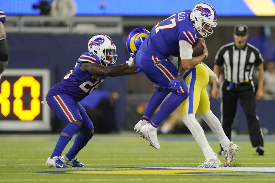 fBuffalo Bills quarterback Josh Allen (17) is tackled by Los Angeles Rams cornerback Jalen Ramsey during the second half of an NFL football game Thursday, Sept. 8, 2022, in Inglewood, Calif. (AP Photo/Mark J. Terrill)