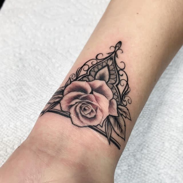 <p>Why make yourself choose between a flower or a crown tattoo when you can have this stunning piece of art by Katrina “Kat Tat” Jackson that combines them both in the best way?</p><p><a href="https://www.instagram.com/p/CEIHszig1DC/" rel="nofollow noopener" target="_blank" data-ylk="slk:See the original post on Instagram;elm:context_link;itc:0;sec:content-canvas" class="link ">See the original post on Instagram</a></p>