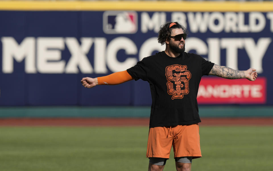 San Francisco Giants pitcher Jakob Junis warms up during a practice session at Alfredo Harp Helu Stadium in Mexico City, Friday, April 28, 2023. (AP Photo/Fernando Llano)