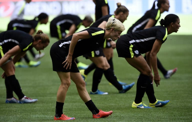 USA midfielder Megan Rapinoe (C) takes part in a training session at the BC Place stadium in Vancouver on July 4, 2015 on the eve of the 2015 FIFA Women's World Cup final