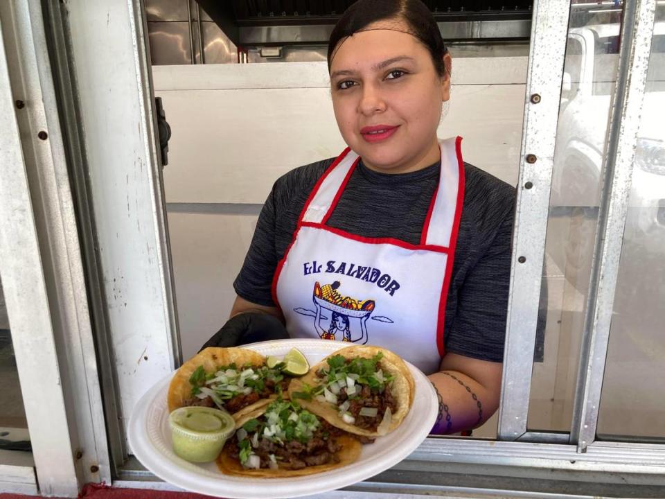 Christina Estrada Martinez serves up asada tacos at Delicias Salvadorenas, a new walk-up restaurant at 415 Green St. offering authentic Salvadoran tacos, pupusas and tortas.