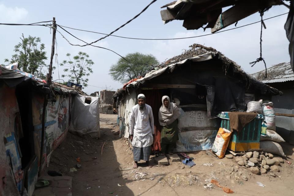 <div class="inline-image__caption"><p>Soliha Ahmad and Zahoora Ara outside their tin-shack in Jammu.</p></div> <div class="inline-image__credit">Bhat Burhan</div>