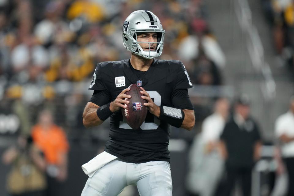 Las Vegas Raiders quarterback Jimmy Garoppolo (10) throws the ball against the Pittsburgh Steelers in the first half at Allegiant Stadium.