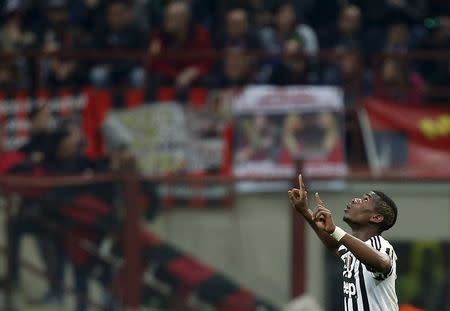 Football Soccer - AC Milan v Juventus - San Siro stadium, Milan, Italy- 9/04/16 - Juventus' Paul Pogba celebrates after scoring. REUTERS/Alessandro Garofalo