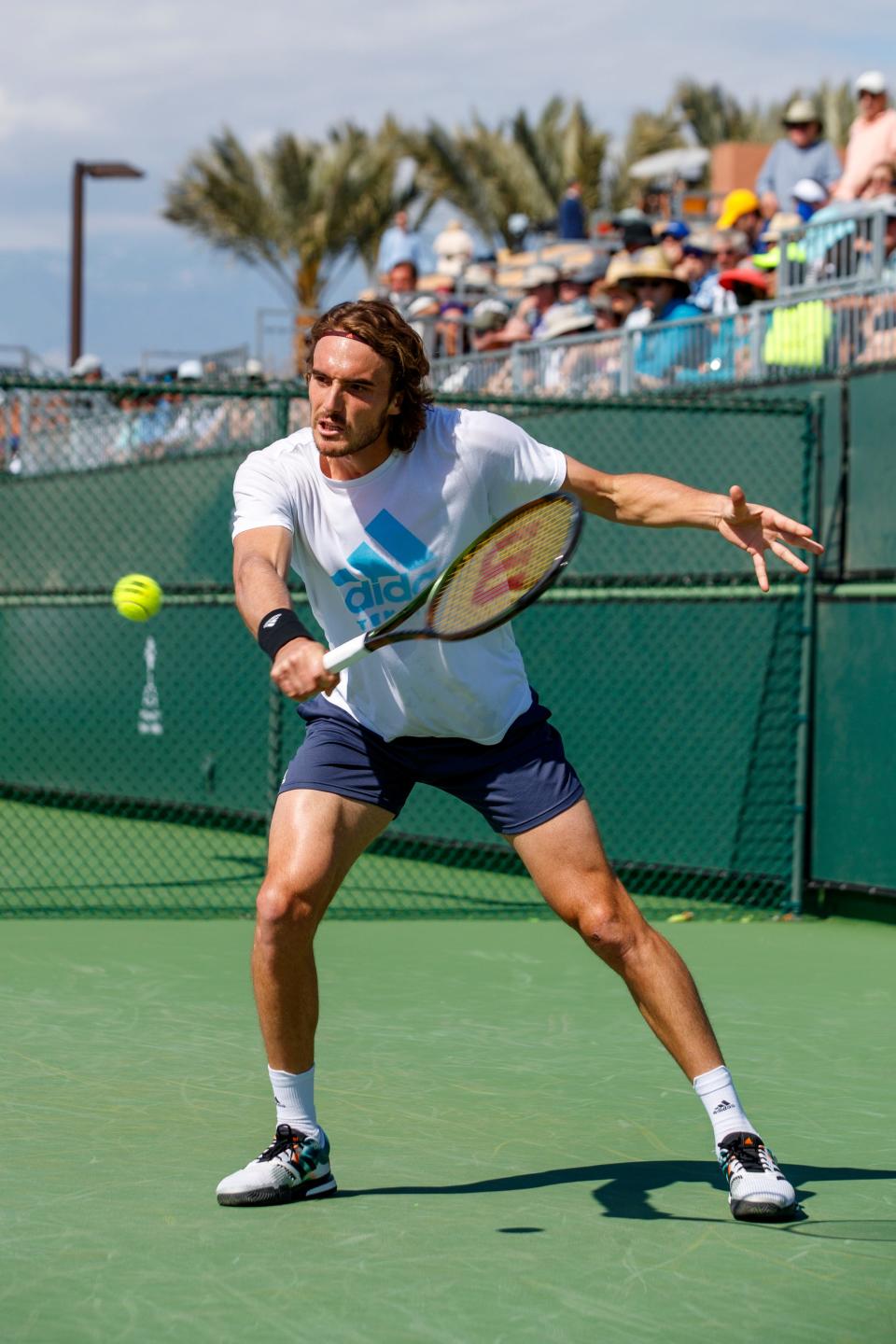 Stefanos Tsitsipas returns to Rafael Nadal during their practice session on day four of the BNP Paribas Open in Indian Wells, Calif., on March 10, 2022.  