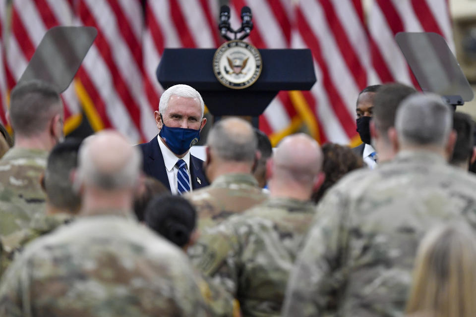 Vice President Mike Pence meets with soldiers following his remarks to the Army's 10th Mountain Division, many of whom have recently returned from Afghanistan, in Fort Drum, N.Y., Sunday, Jan. 17, 2021. (AP Photo/Adrian Kraus)