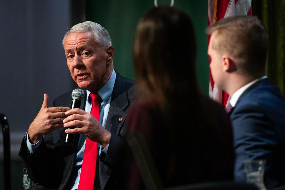 Retiring Colorado Congressman Ken Buck speaks at a public forum about the state of democracy in Colorado and the country as part of CSU's Thematic Year of Democracy at Colorado State University in Fort Collins on Friday.