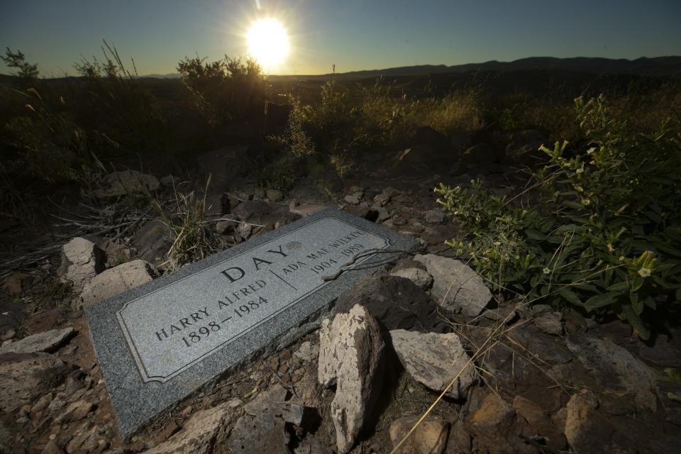 A headstone for Harry Alfred Day and Ada Mae Wilkey Day, the parents of Sandra Day O'Connor atop of Round Mountain on the Lazy B Ranch outside of Duncan, Ariz., on Nov. 2, 2018. Former Supreme Court Justice Sandra Day O'Connor grew up on the ranch. Ashes of Harry Alfred Day and Ada Mae Wilkey Day, were spread atop of Round Mountain. Sandra Day O'Connor has expressed that her ashes are also spread atop the mountain when she dies, according to her brother, Alan Day.