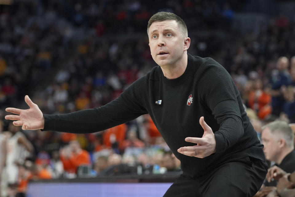 Ohio State interim coach Jake Diebler reacts toward a referee during the second half of an NCAA college basketball game against Illinois in the quarterfinal round of the Big Ten Conference tournament, Friday, March 15, 2024, in Minneapolis. (AP Photo/Abbie Parr)