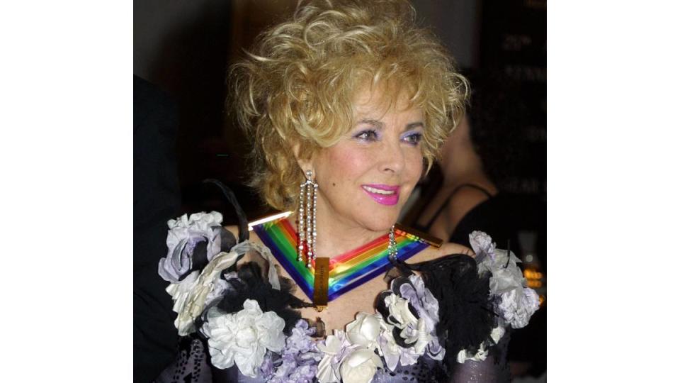 Elizabeth Taylor with award