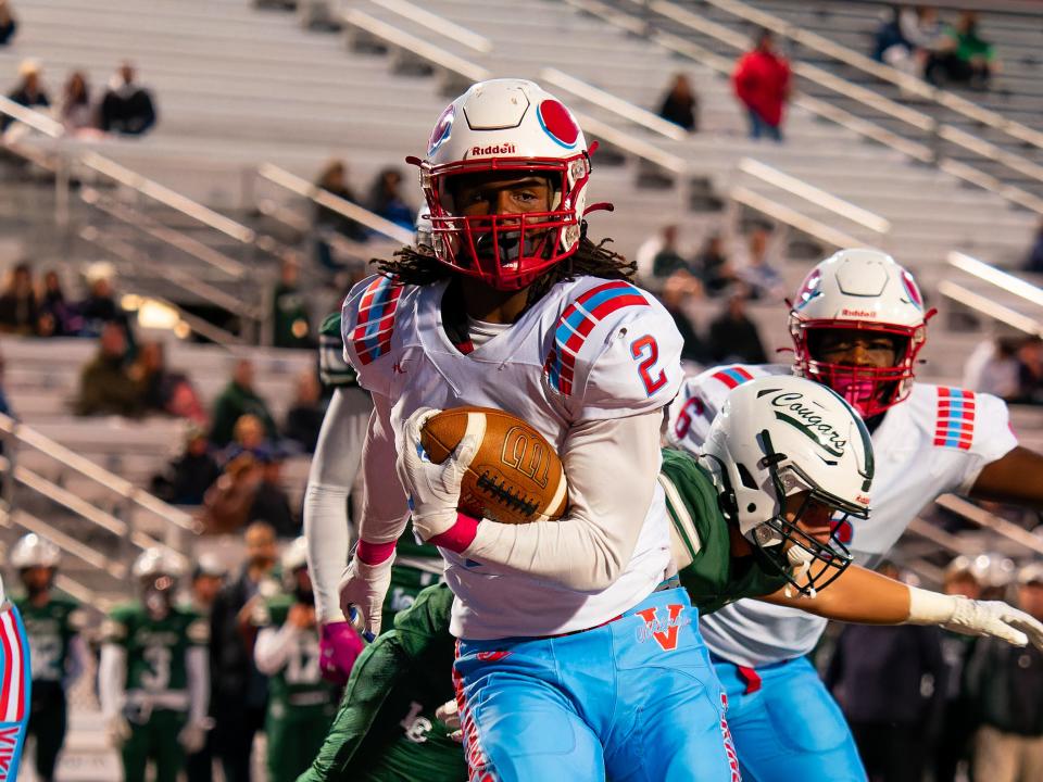 Lamar "Bo" Jackson, carrying the ball at Jerome T. Osborne Stadium Oct. 15, 2022, has been voted one of the top 23 football players in the state by Gannett Ohio Network writers ahead of the 2023 season.