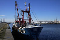 The British trawler kept by French authorities docks at the port in Le Havre, western France, Thursday, Oct. 28, 2021. French authorities fined two British fishing vessels and kept one in port overnight Thursday Oct.28, 2021 amid a worsening dispute over fishing licenses that has stoked tensions following the U.K.'s departure from the European Union. (AP Photo/Michel Euler)