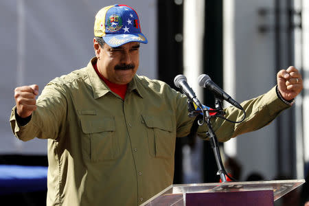 FILE PHOTO: Venezuela's President Nicolas Maduro gestures as he speaks during a rally to commemorate the 26th anniversary of late Venezuelan President Hugo Chavez failed coup attempt in Caracas, Venezuela February 4, 2018. REUTERS/Marco Bello