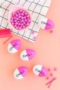 <p>Who couldn’t use a few of these? Turn your eggs into chill pills using pink acrylic paint, painter’s tape to mask off the white half, and small black letter stickers to spell out the message. </p><p><em><a href="http://www.awwsam.com/2018/03/diy-chill-pill-easter-eggs.html" rel="nofollow noopener" target="_blank" data-ylk="slk:Get the tutorial at Aww Sam;elm:context_link;itc:0;sec:content-canvas" class="link ">Get the tutorial at Aww Sam </a></em></p>