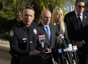 Beverly Hills Police Chief Mark G. Stainbrook, left, addresses the media during a news conference, Wednesday, Dec. 1, 2021, in Beverly Hills, Calif. Jacqueline Avant, the wife of music legend Clarence Avant, was fatally shot in Beverly Hills early Wednesday. Second from left is Beverly Hills Mayor Robert Wunderlich. (AP Photo/Chris Pizzello)