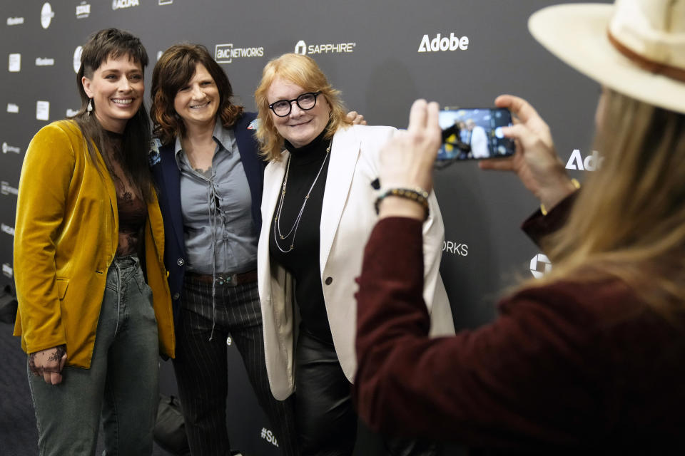 Alexandria Bombach, left, Amy Ray and Emily Saliers attend the premiere of "It's Only Life After All" at The Ray Theatre during the 2023 Sundance Film Festival on Thursday, Jan. 19, 2023, in Park City, Utah. (Photo by Charles Sykes/Invision/AP)