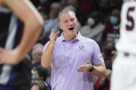 Kansas State coach Jeff Mittie communicates with players during the first half of an NCAA college basketball game against South Carolina Friday, Dec. 3, 2021, in Columbia, S.C. (AP Photo/Sean Rayford)