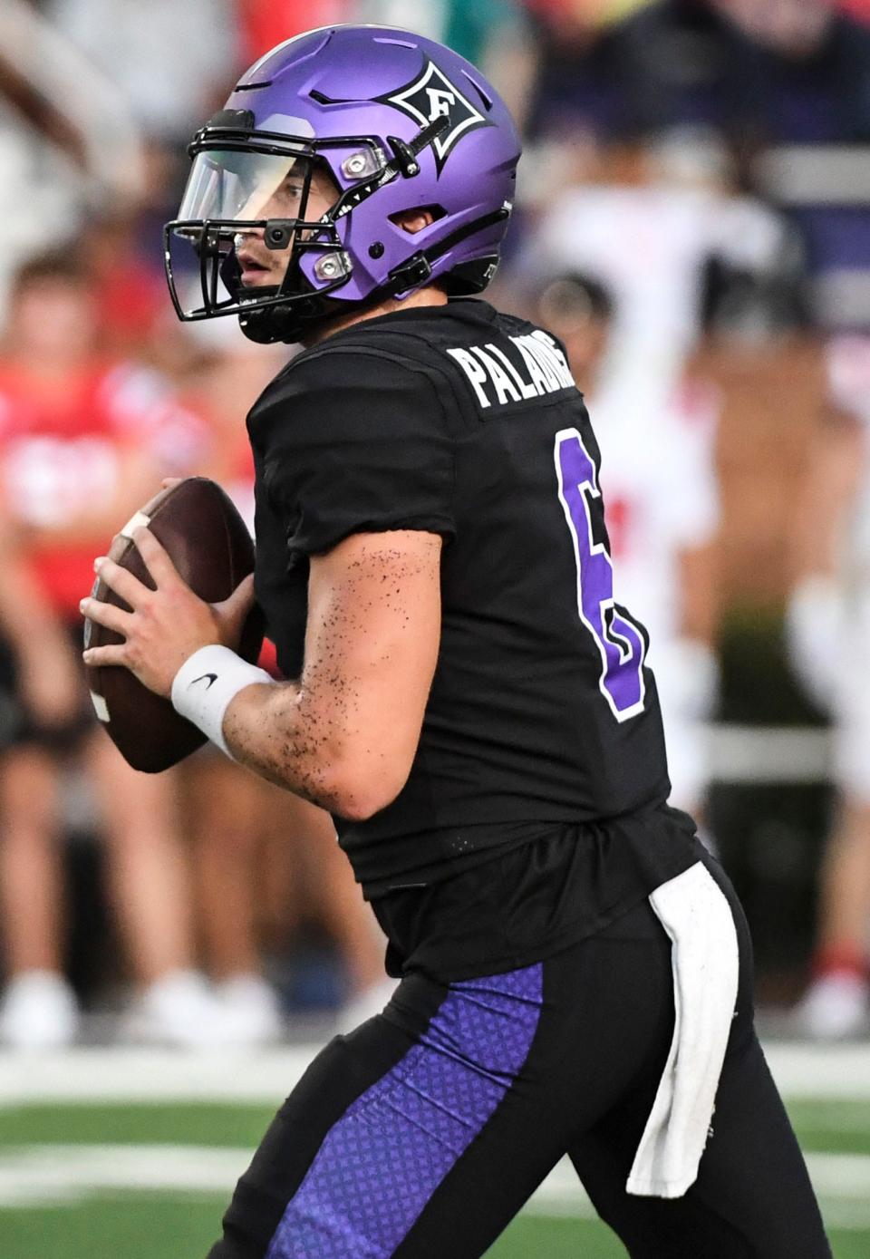 Furman Paladins quarterback Tyler Huff (6) looks for an open pass while playing against North Greenville Crusaders at Paladin Stadium in Greenville, Thursday, September 1, 2022.