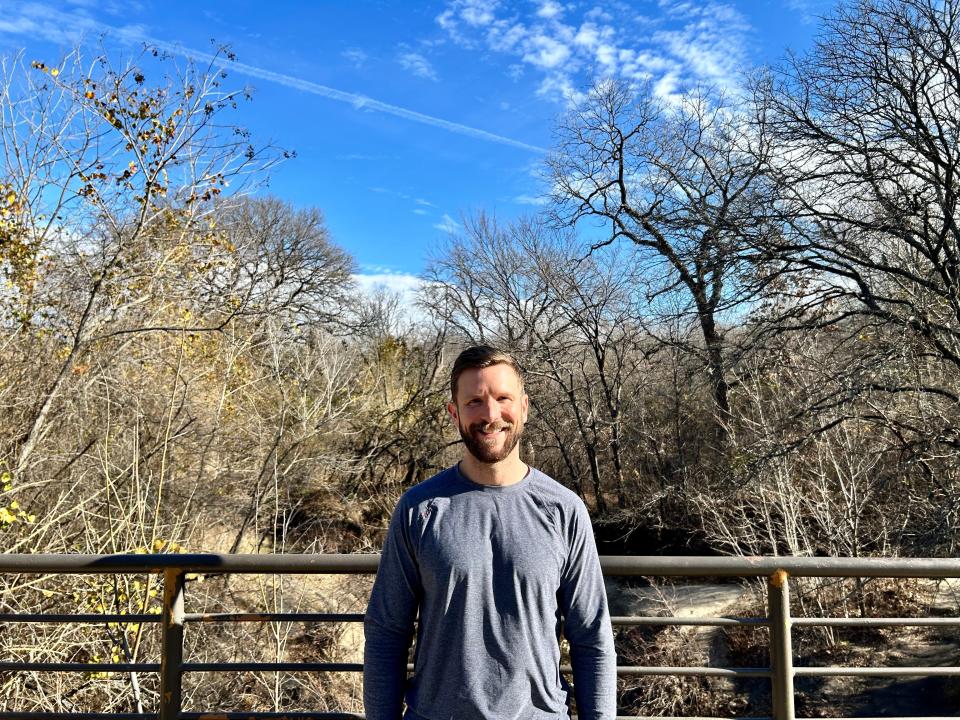 Joseph Poduslo poses at a community outing to Arbor Hills Nature Preserve in Plano, TX. Poduslo is recovering from a brain injury at 42.