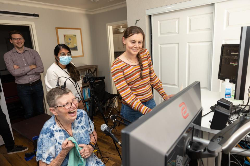 A research subject named Pat tries out a brain-computer interface designed to help her speak.