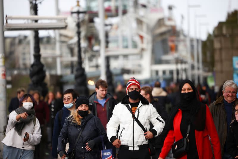 People walk along the South Bank, amid the coronavirus disease (COVID-19) outbreak, in London