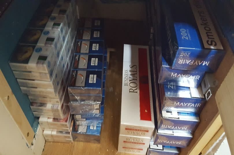 Counterfeit cigarettes hidden in a secret compartment uncovered by Operation Usk