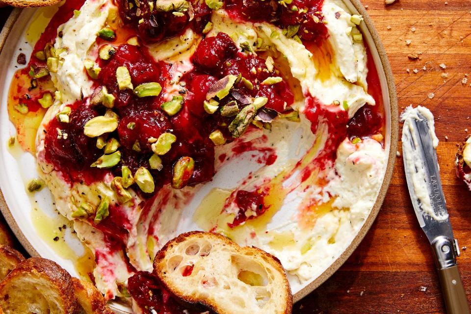 whipped garlic and herb feta, topped with fresh cranberry sauce, pistachios, and honey