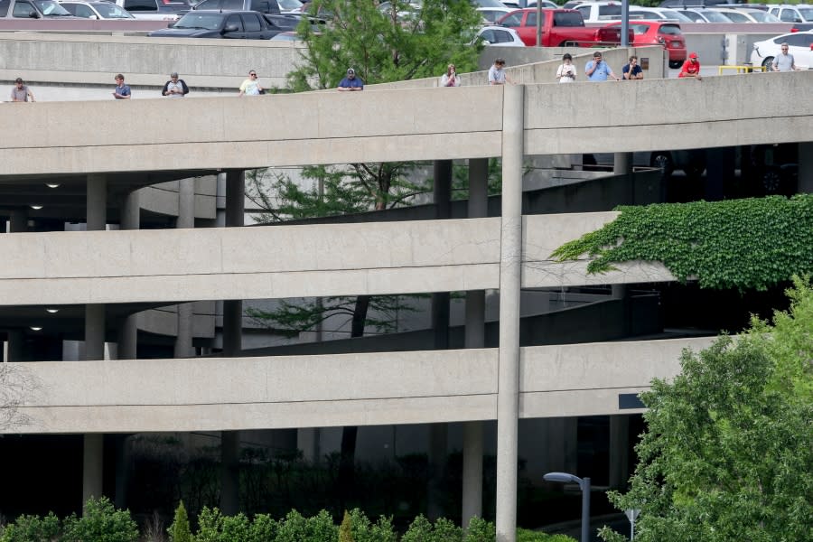 Tulsa police and firefighters respond to a shooting at the Natalie Medical Building Wednesday, June 1, 2022. in Tulsa, Okla. Multiple people were shot at a Tulsa medical building on a hospital campus Wednesday. (Ian Maule/Tulsa World via AP)