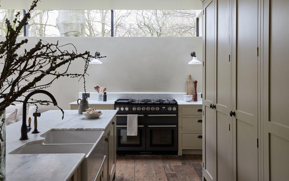 The bedrooms' original pine floorboards were reused in the new kitchen