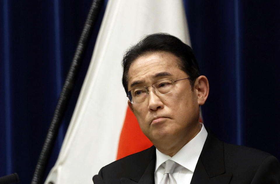 Japan's Prime Minister Fumio Kishida attends a news conference after his cabinet shuffle in Tokyo, Wednesday, Sept. 13, 2023. Kishida shuffled his Cabinet and key party posts Wednesday in an apparent move to strengthen his position before a key party leadership vote next year, while appointing more women to showcase his effort for women's advancement in his conservative party. (Issei Kato/Pool Photo via AP)