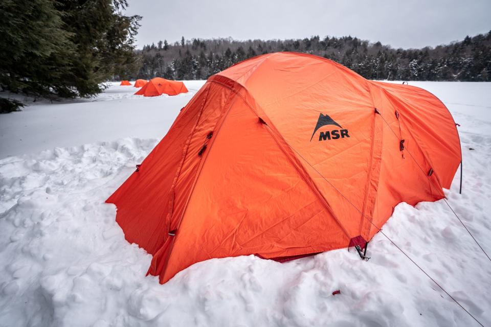 Make sure your cold-weather tent is snug and dry to keep the snow from creeping in.