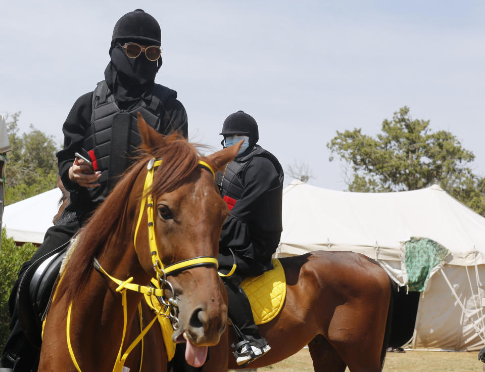 In this Saturday, Aug. 24, 2019 photo, Saudi women ride horses during the al-Soudah festival in Abha, southwest Saudi Arabia. The scenes of women zip lining and horseback riding, young Saudis at concerts, in a remote village nonetheless, are a stark departure from ultraconservative policies that for decades barred concerts and gender mixing, and shunned women’s sports in the kingdom. (AP Photo/Amr Nabil)