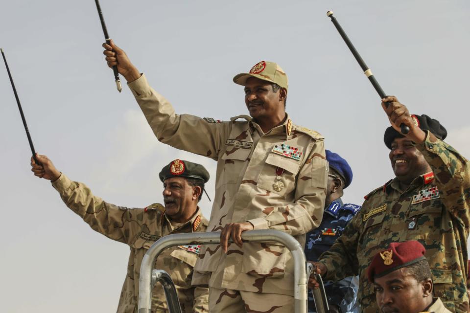 Gen. Mohammed Hamdan Dagalo, the deputy head of the military council, speaks during a military-backed tribe's rally, in the Nile River State, Sudan, Saturday, July 13, 2019. (AP Photo/Mahmoud Hjaj)