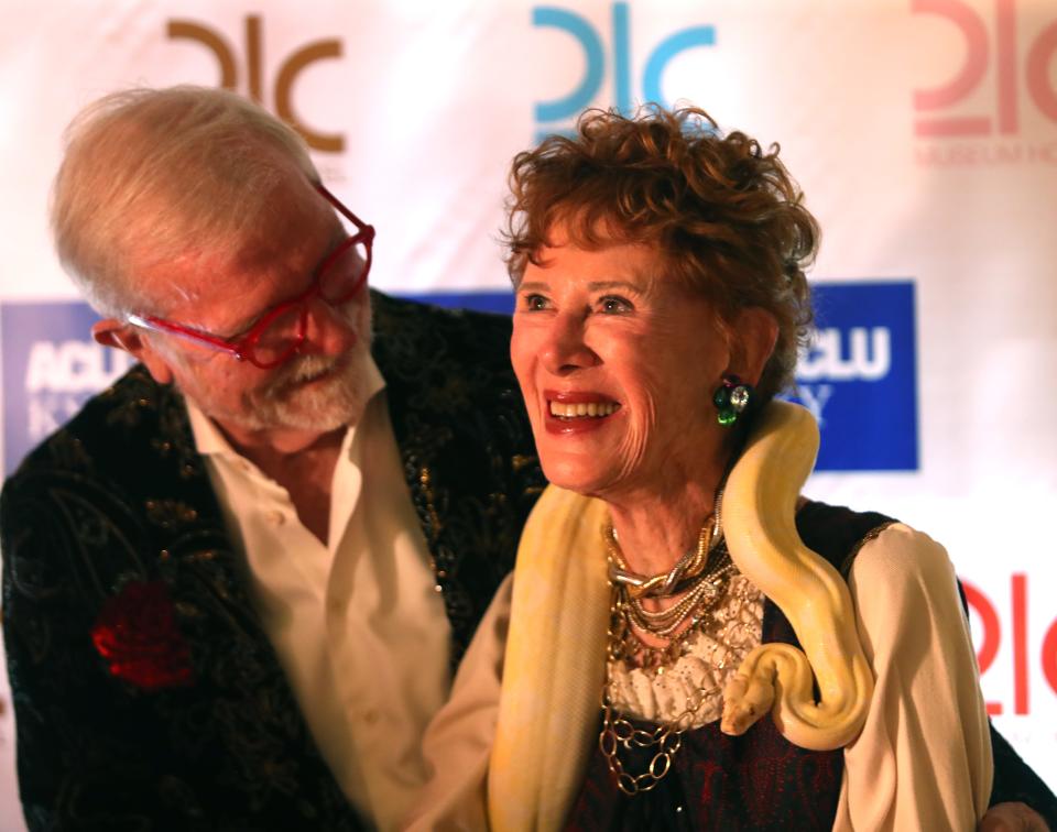 Steve Wilson and Laura Lee Brown pose with a snake at Steve's Derby Eve Drag Circus at 21c Museum Hotel. May 5, 2023