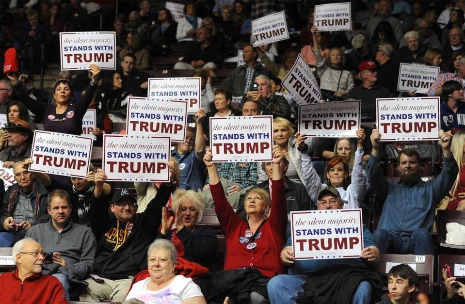 Donald Trump supporters hold up signs of support prior to rally at the Winthrop University Coliseum in Rock Hill, SC on Friday, January 8, 2016. A Winthrop University Poll last month found six out of 10 S.C. voters frustrated with the federal government, while more than a third described themselves as angry. Among Trump supporters, almost half – 47 percent – are angry.
