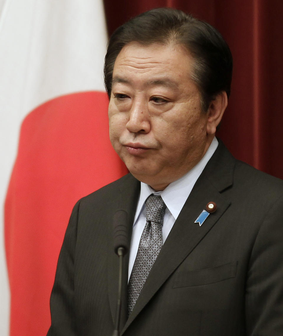 Japan's Prime Minister Yoshihiko Noda listens to a reporter's question during a press conference at his official residence in Tokyo, Friday, March 30, 2012. Prime Minister Noda vowed to stake his political career to achieve the sales tax increase Friday as his Cabinet endorsed a legislation to help counter the country's fiscal deficit. (AP Photo/Shizuo Kambayashi)