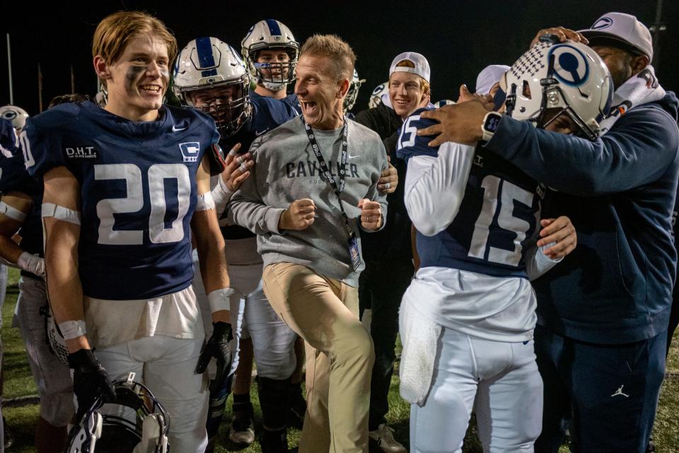 Central Valley Christian players celebrate after beating Los Gatos 45-42 in the CIF State Football Championship at Pasadena City College in Pasadena CA on Saturday, Dec. 09, 2023.