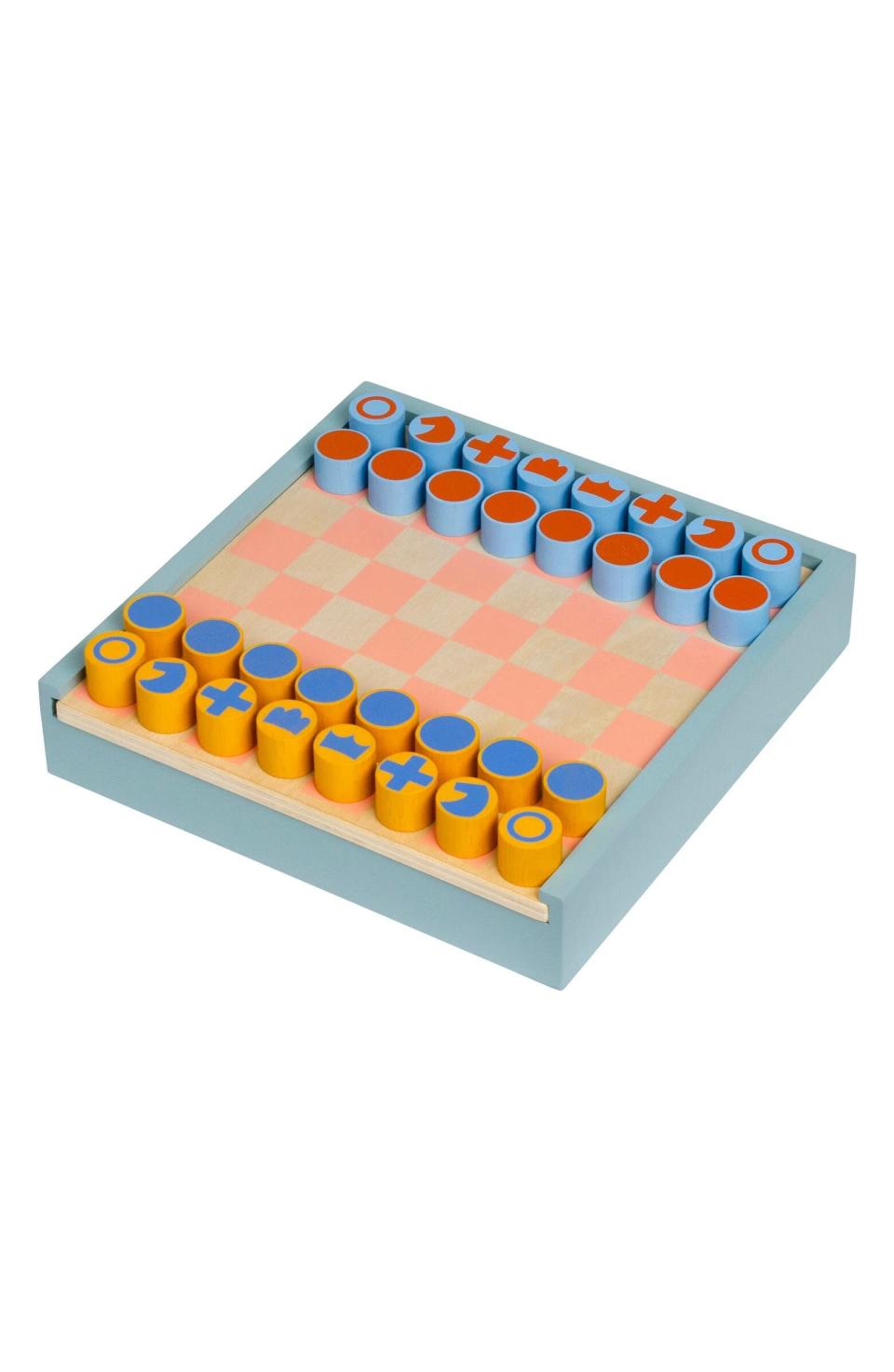 Now you don't have to switch pieces to play a game of checkers when you're done with chess. These practical pieces flip over. The wooden box also acts as storage. We're sure there will be lots of <i>colorful</i> games played on it. <a href="https://fave.co/3g4clzQ" target="_blank" rel="noopener noreferrer">Find it for $55 at Nordstrom</a>.