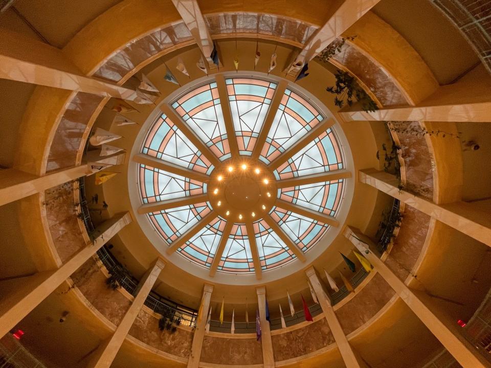 The rotunda skylight evokes images of native weaving using tones of earth and sky.