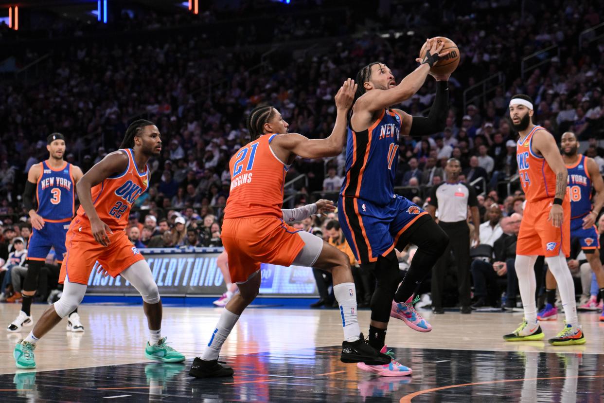 Mar 31, 2024; New York, New York, USA; New York Knicks guard Jalen Brunson (11) shoots the ball while being defended by Oklahoma City Thunder guard Aaron Wiggins (21) during the second quarter at Madison Square Garden. Mandatory Credit: John Jones-USA TODAY Sports