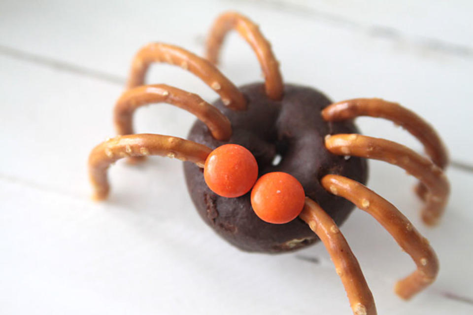 <p>Large pretzel twists, mini donuts, M&Ms, and a little frosting or chocolate. That's all you need to make some cute little donut spiders. </p><p><strong>Get the recipe: </strong><a href="https://www.itsalwaysautumn.com/easy-mini-donut-spiders-easy-halloween-treat-kids-can-make.html" rel="nofollow noopener" target="_blank" data-ylk="slk:Mini Donut Spiders;elm:context_link;itc:0;sec:content-canvas" class="link ">Mini Donut Spiders</a></p>