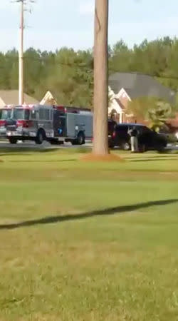 Emergency personnel are seen on site in the aftermath of a shooting in Florence, South Carolina, U.S. October 3, 2018, in this still image obtained from a social media video. Derek Lowe/via REUTERS