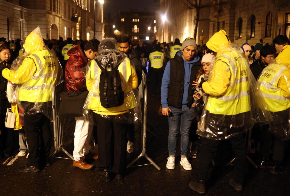 Security teams check tickets for viewing platforms with the event sold out (EPA)