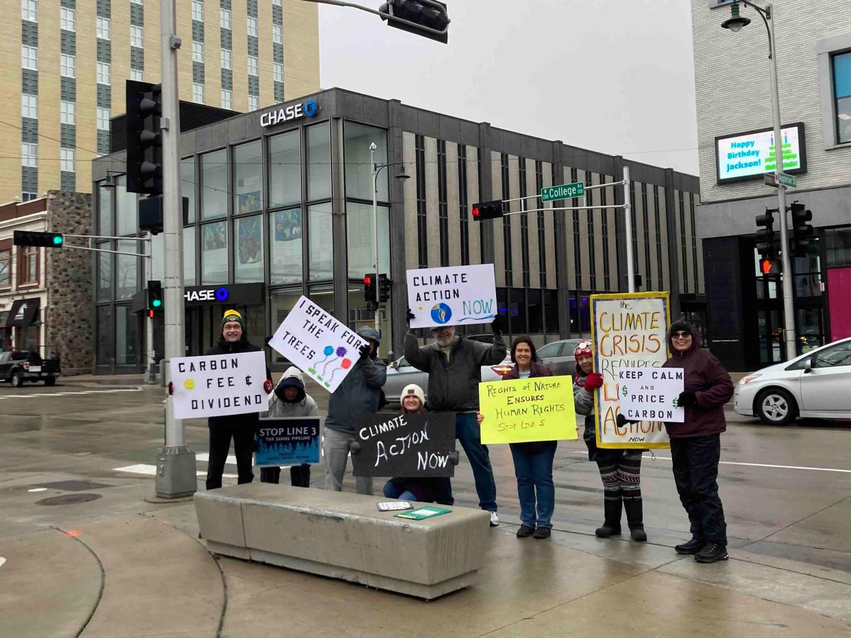 A group gathers at Houdini Plaza for a March Forth to Earth Day climate strike. The rally is part of a statewide project to bring together environmental and racial justice groups to unite their efforts on climate action.