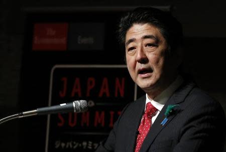 Japan's Prime Minister Shinzo Abe gives a keynote address at Japan Summit 2014 hosted by the Economist magazine in Tokyo April 17, 2014. REUTERS/Yuya Shino
