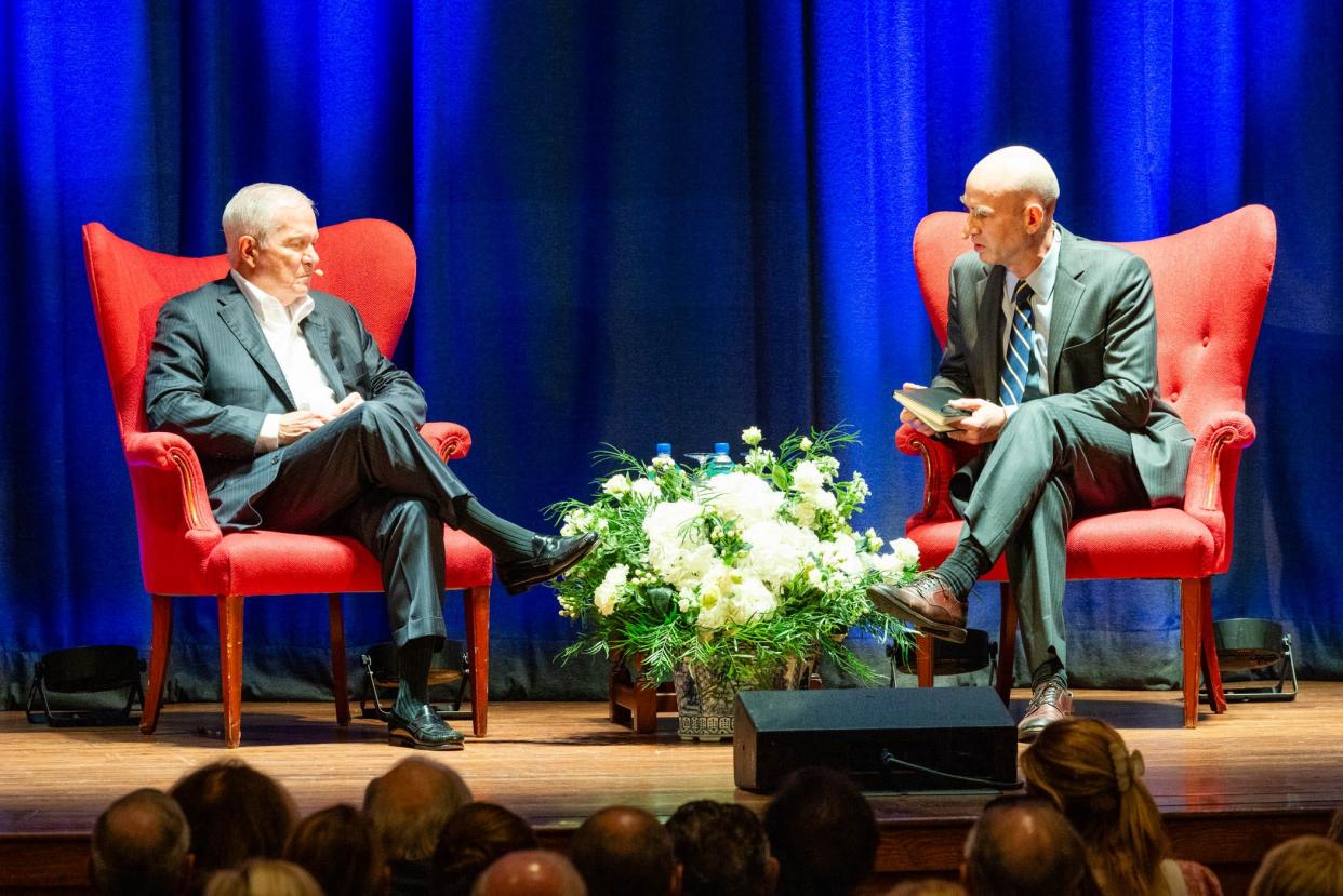 Former U.S. Defense Secretary Robert Gates, left, speaks Tuesday during a lecture at the Society of the Four Arts moderated by James Bennet, right, senior editor at The Economist.