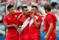 <p>Peru players may be thinking what might have been as they celebrate their first win at the World Cup </p>
