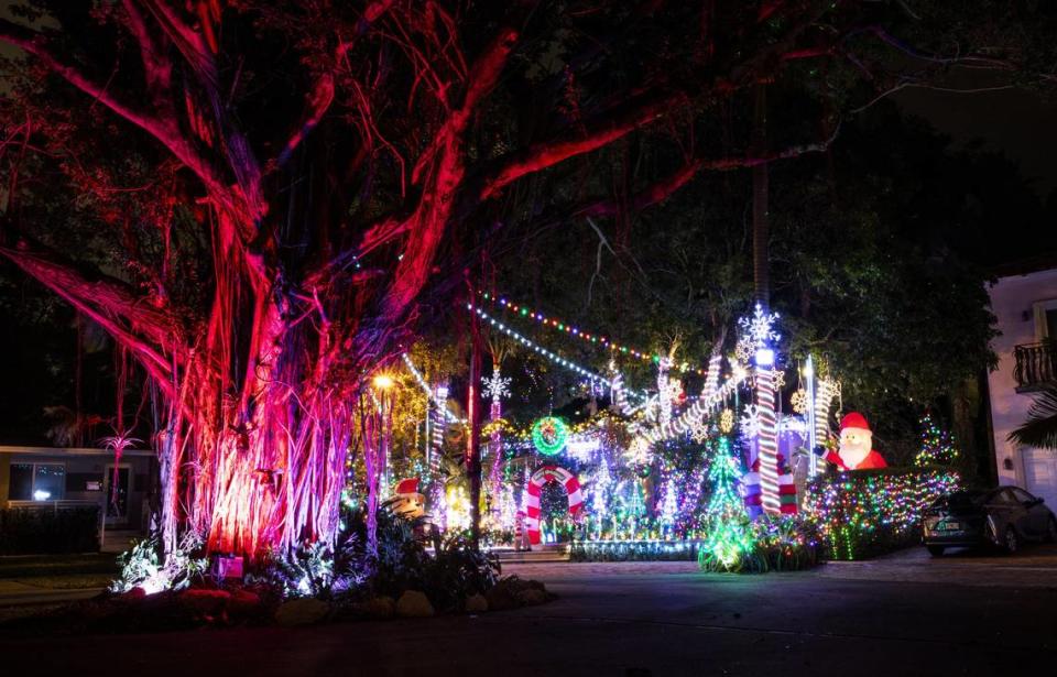 Michael Hornyak’s house is festooned in holiday lights at the end of a cul-de-sac at 3050 Lime Court in Coconut Grove.
