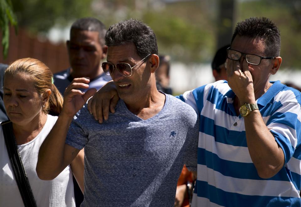 <p>Grieving relatives of passengers who perished in Cuba’s worst aviation disaster arrive to the morgue, in Havana, Cuba, Saturday, May 19, 2018. (Photo: Ramon Espinosa/AP) </p>